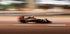 F1 Car in Motion Plakat - Posterbox.no
