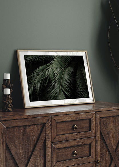 a picture frame sitting on top of a dresser