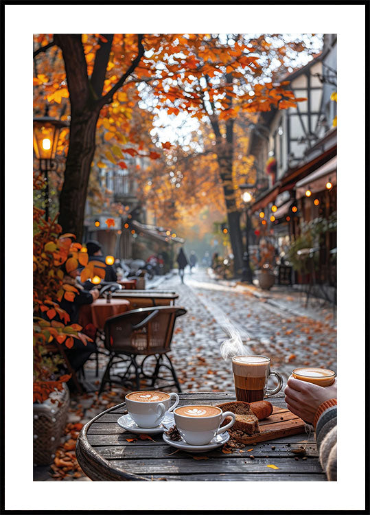 two cups of coffee are sitting on a table