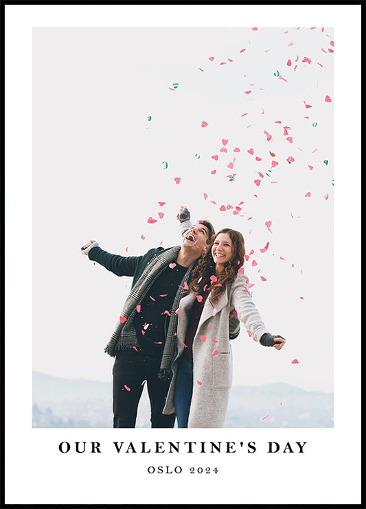 a man and a woman standing under a bunch of confetti