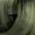 The image is a close-up of a textured, green-colored surface with a repeating pattern of vertical lines and curves.